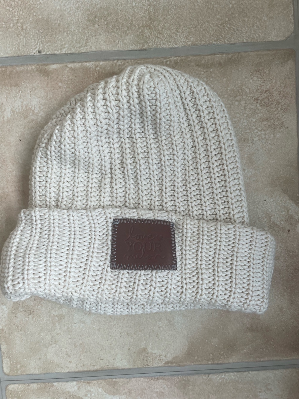 Love Your Melon Cream knit beanie brown leather logo patch; OS